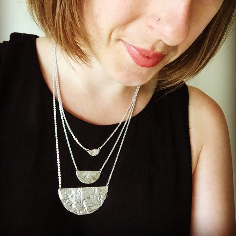 Reticulated Half Moon Necklace Collection