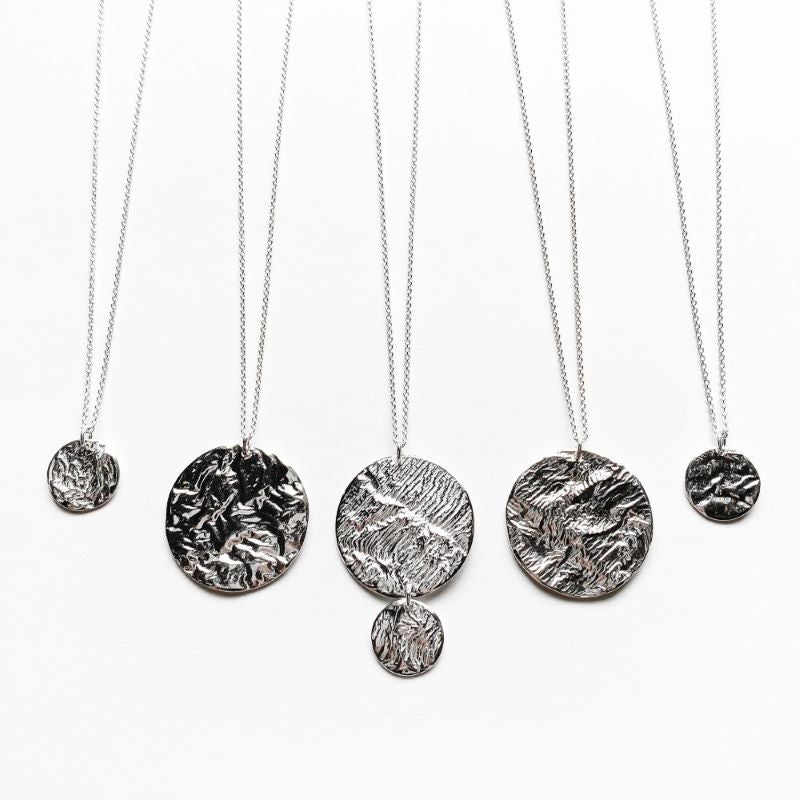 Reticulated Moon Necklaces Collection